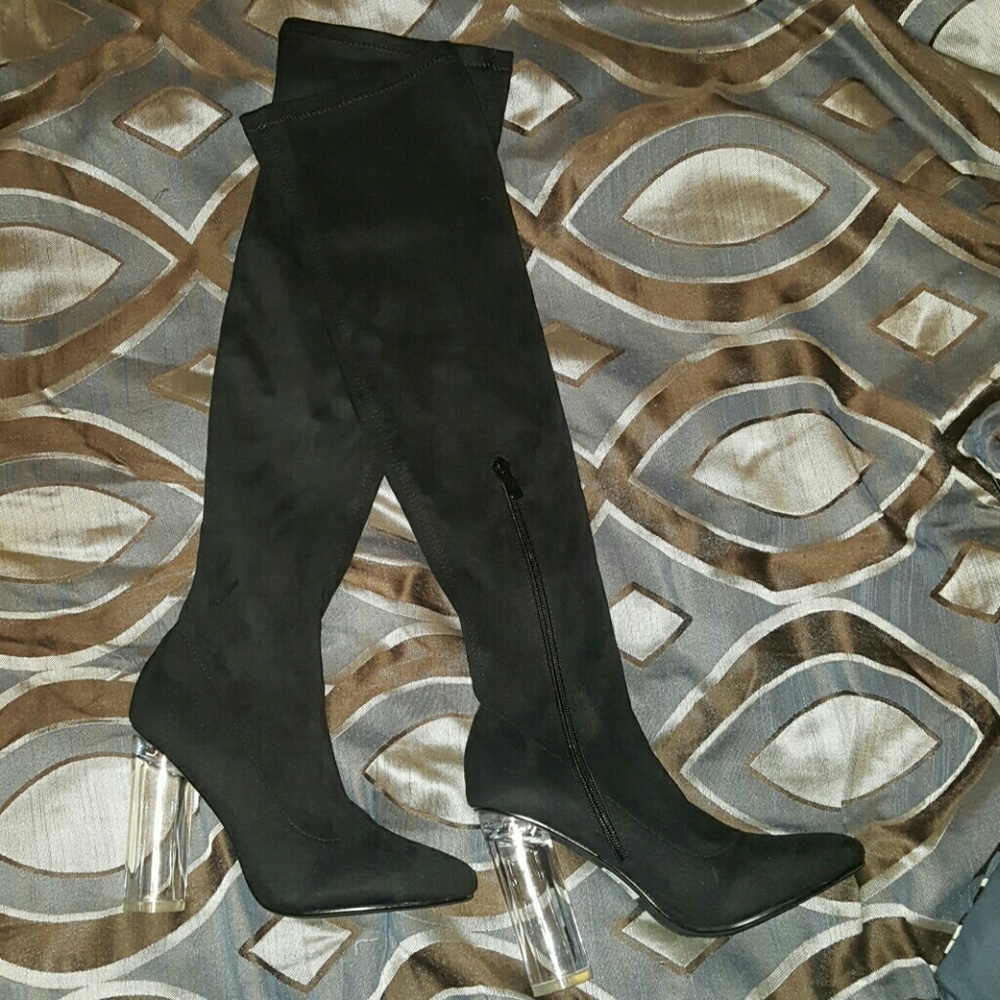 Knee high black heel boots